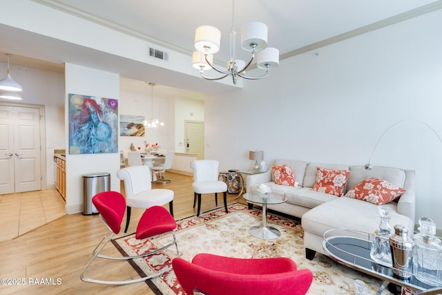 201 Settlers Trace Blvd Unit 4404, Lafayette, LA 70508 - living room with a chandelier, light wood-style flooring, and crown molding