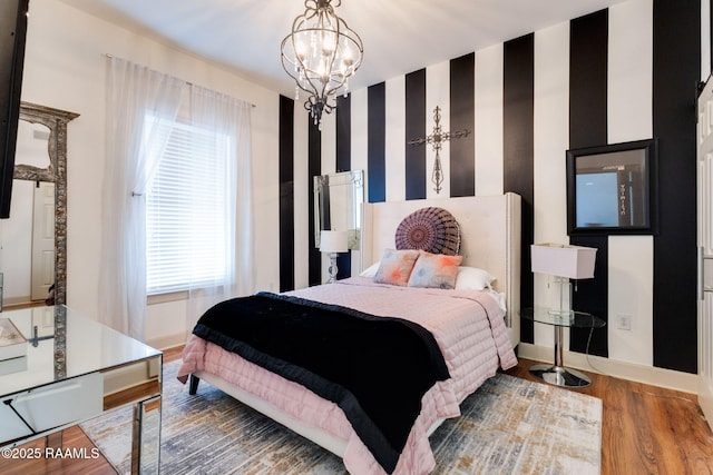 201 Settlers Trace Blvd Unit 4404, Lafayette, LA 70508 - bedroom with wood finished floors and a chandelier