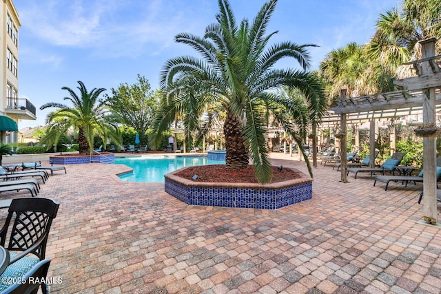 201 Settlers Trace Blvd Unit 4404, Lafayette, LA 70508 - community pool with a patio area and a pergola