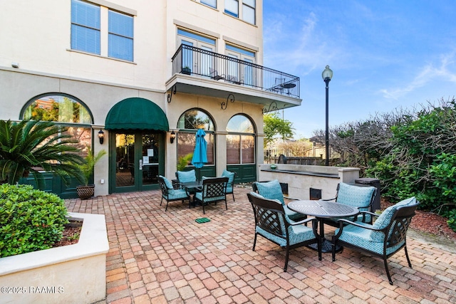 201 Settlers Trace Blvd Unit 4404, Lafayette, LA 70508 - patio / terrace with a patio area and outdoor dining space