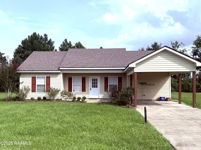 1108 Poydras Pl, Breaux Bridge, LA 70517 - ranch-style house with concrete driveway, roof with shingles, a front yard, and an attached carport