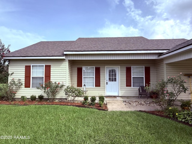 1108 Poydras Pl, Breaux Bridge, LA 70517 - ranch-style home featuring roof with shingles, a front lawn, a garage, and a porch