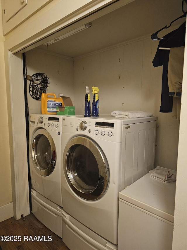 118 Pollard Ave, New Iberia, LA 70563 - laundry area with washing machine and clothes dryer and dark wood finished floors