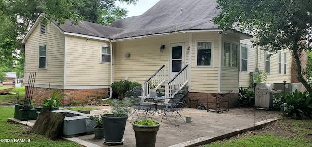 118 Pollard Ave, New Iberia, LA 70563 - rear view of property featuring a patio area and entry steps