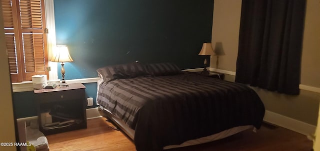 118 Pollard Ave, New Iberia, LA 70563 - bedroom with baseboards and wood finished floors