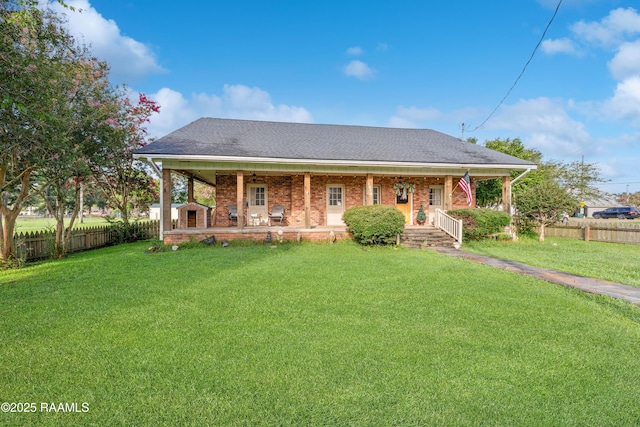 1054 Main St, Parks, LA 70582 - bungalow featuring a porch, brick siding, and roof with shingles