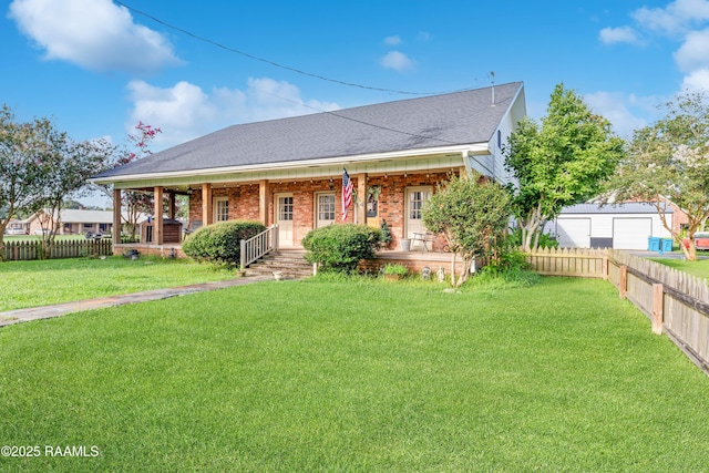 1054 Main St, Parks, LA 70582 - view of front facade featuring a porch, a fenced backyard, brick siding, and a garage
