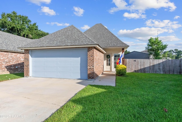 119 Alpine Dr, Lafayette, LA 70506 - view of front of home featuring a shingled roof, driveway, brick siding, and an attached garage