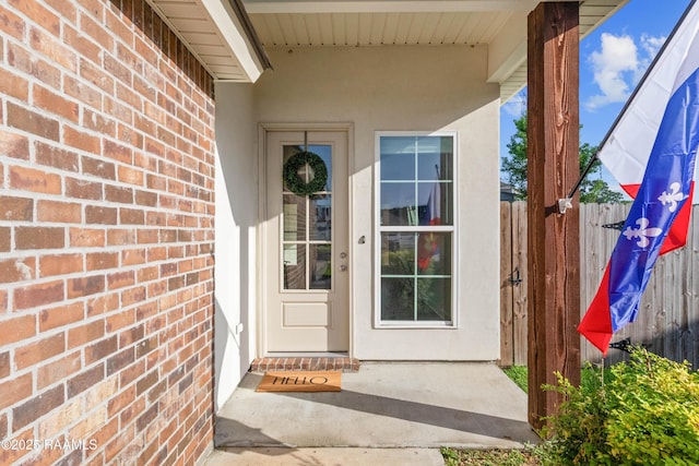 119 Alpine Dr, Lafayette, LA 70506 - view of exterior entry with brick siding and stucco siding