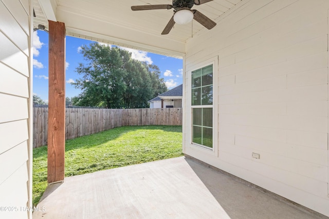 119 Alpine Dr, Lafayette, LA 70506 - fenced backyard with a ceiling fan and a patio