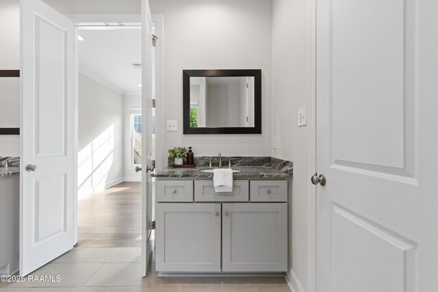 119 Alpine Dr, Lafayette, LA 70506 - bathroom with crown molding and vanity