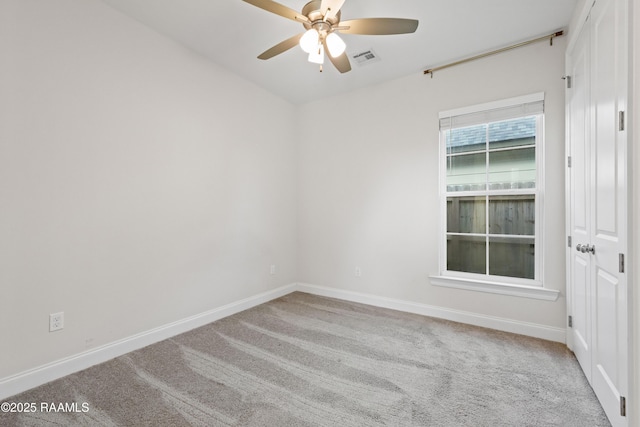 119 Alpine Dr, Lafayette, LA 70506 - empty room with a ceiling fan and carpet flooring