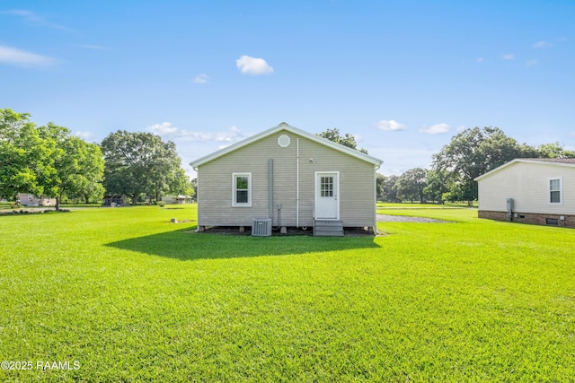 1044 Babineaux Rd, Breaux Bridge, LA 70517 - back of property with entry steps and a lawn