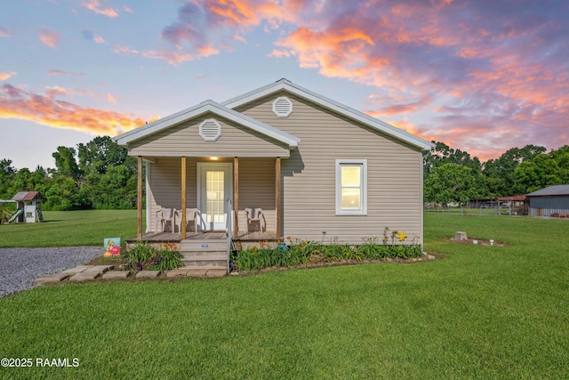 1044 Babineaux Rd, Breaux Bridge, LA 70517 - view of front facade with a porch and a front yard