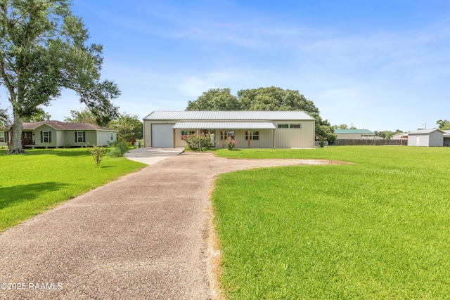 7011 Cameron St, Duson, LA 70529 - single story home featuring driveway, a front yard, and a garage