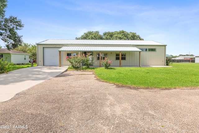 7011 Cameron St, Duson, LA 70529 - single story home with concrete driveway, a front lawn, an attached garage, and covered porch