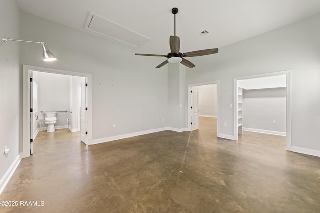 7011 Cameron St, Duson, LA 70529 - unfurnished bedroom featuring attic access, concrete flooring, a walk in closet, and ensuite bathroom