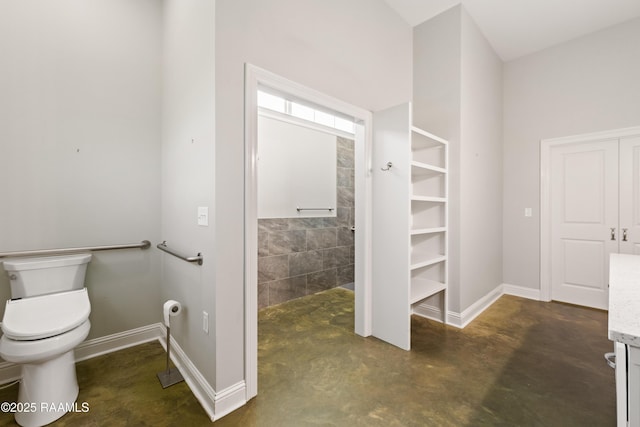 7011 Cameron St, Duson, LA 70529 - bathroom with concrete floors, vanity, and a closet