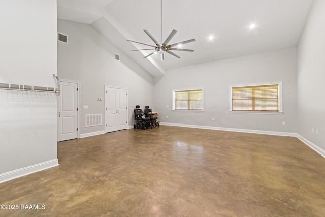 7011 Cameron St, Duson, LA 70529 - unfurnished living room featuring concrete floors, high vaulted ceiling, and a ceiling fan