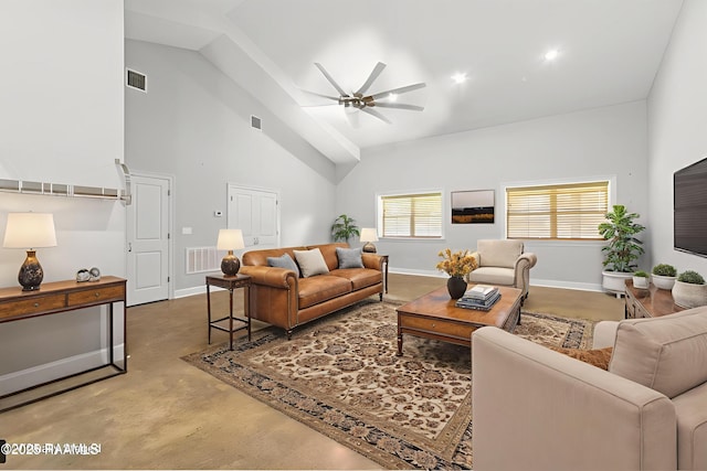 7011 Cameron St, Duson, LA 70529 - living area featuring finished concrete flooring, ceiling fan, and high vaulted ceiling