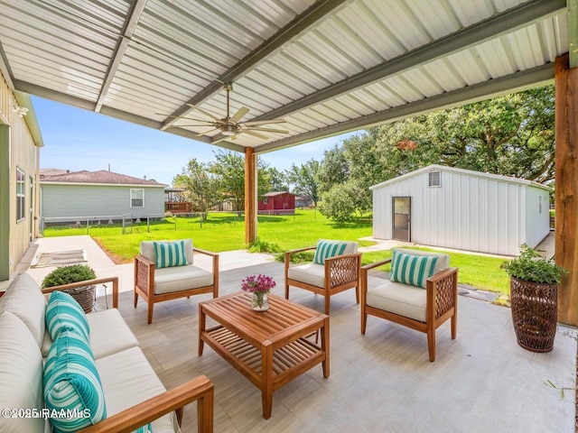 7011 Cameron St, Duson, LA 70529 - view of patio featuring an outdoor living space, an outbuilding, and ceiling fan