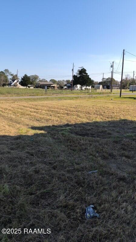 9028 La Cote Rd, Maurice, LA 70555 - view of grassy yard with a view of rural / pastoral area