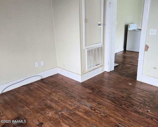 9028 La Cote Rd, Maurice, LA 70555 - spare room featuring washer / dryer and hardwood / wood-style flooring