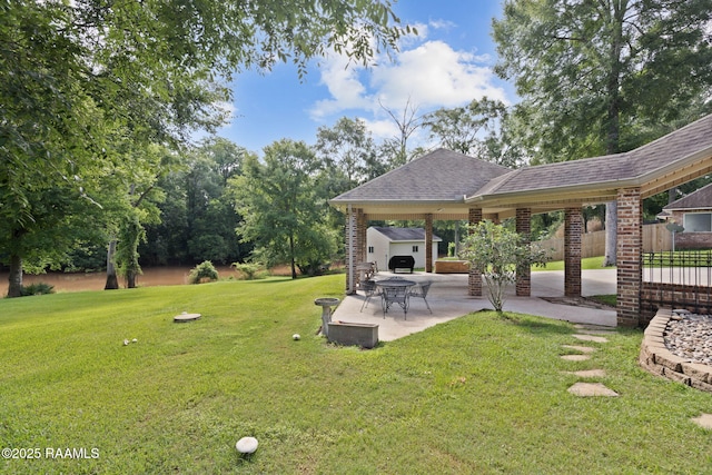 124 Buttercup Dr, Washington, LA 70589 - view of yard with a patio and an outdoor structure