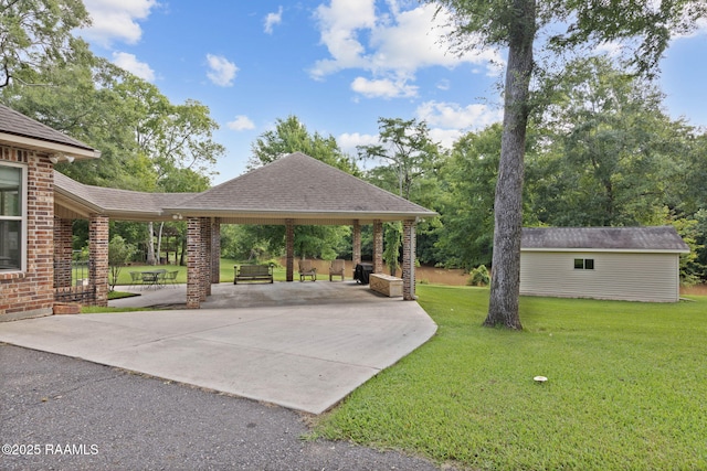 124 Buttercup Dr, Washington, LA 70589 - view of patio featuring concrete driveway