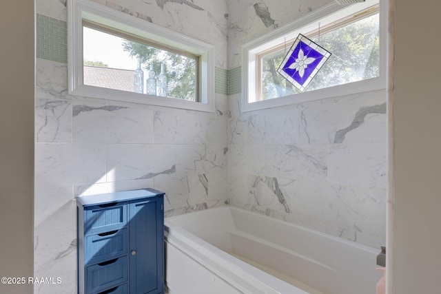 124 Buttercup Dr, Washington, LA 70589 - full bathroom featuring a tub and tile walls
