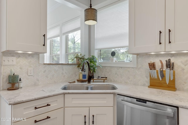 124 Buttercup Dr, Washington, LA 70589 - kitchen featuring dishwasher, white cabinetry, backsplash, and healthy amount of natural light