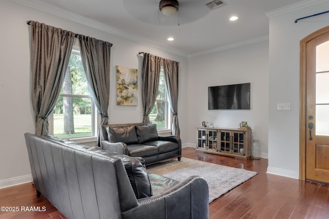 124 Buttercup Dr, Washington, LA 70589 - living area featuring plenty of natural light, wood finished floors, a ceiling fan, ornamental molding, and recessed lighting