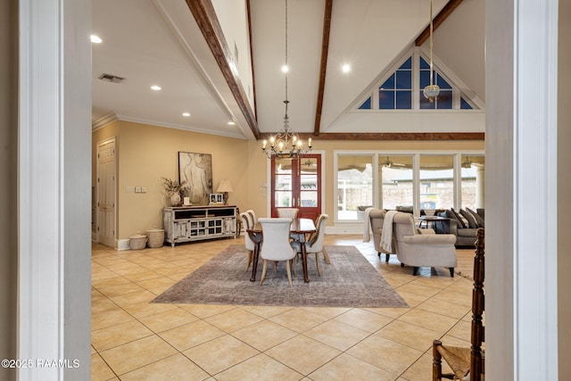 2 Carmel Bnd, New Iberia, LA 70563 - dining room with light tile patterned floors, a chandelier, beamed ceiling, high vaulted ceiling, and ornamental molding