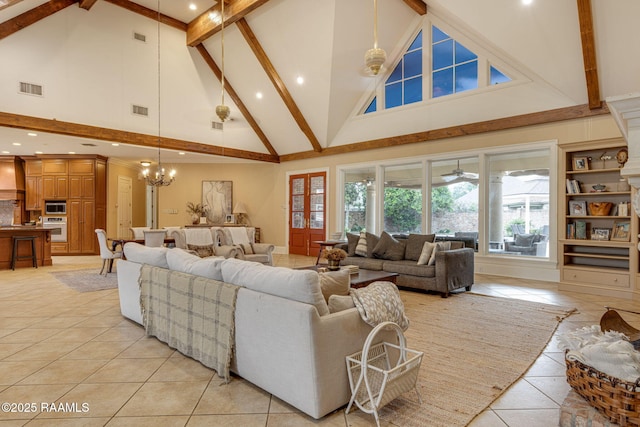 2 Carmel Bnd, New Iberia, LA 70563 - living room with high vaulted ceiling, light tile patterned flooring, beamed ceiling, a chandelier, and recessed lighting