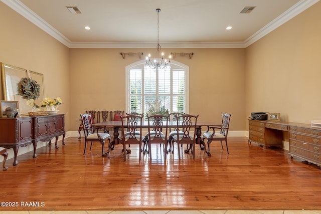 2 Carmel Bnd, New Iberia, LA 70563 - dining room with a chandelier, ornamental molding, light wood-type flooring, and recessed lighting