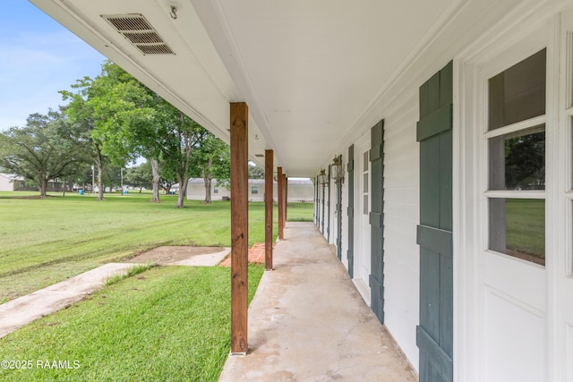 1243 Huval Rd, Breaux Bridge, LA 70517 - porch featuring a lawn