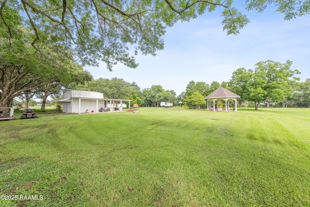 1243 Huval Rd, Breaux Bridge, LA 70517 - view of grassy yard featuring a gazebo