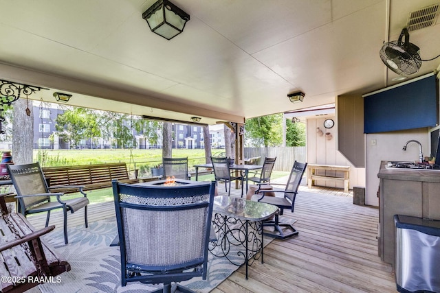 314 Creswell Ave, Scott, LA 70583 - deck with a fire pit and outdoor dining area