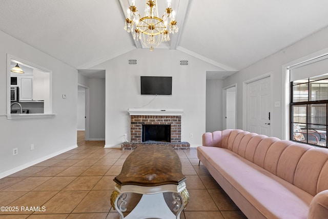 15 Courtyard Cir, Lafayette, LA 70508 - living area featuring tile patterned floors, a chandelier, and a brick fireplace