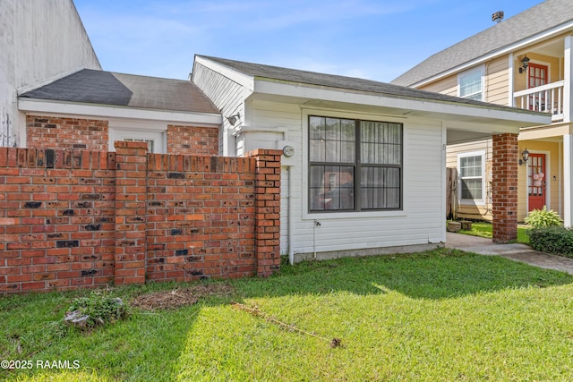 15 Courtyard Cir, Lafayette, LA 70508 - view of side of property featuring brick siding