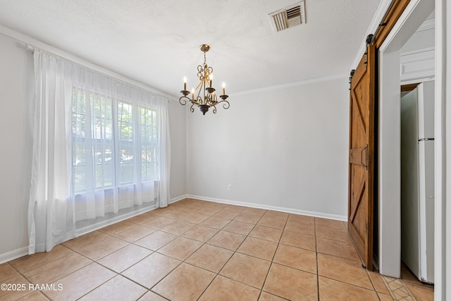 15 Courtyard Cir, Lafayette, LA 70508 - spare room featuring light tile patterned floors, crown molding, a chandelier, a barn door, and a textured ceiling