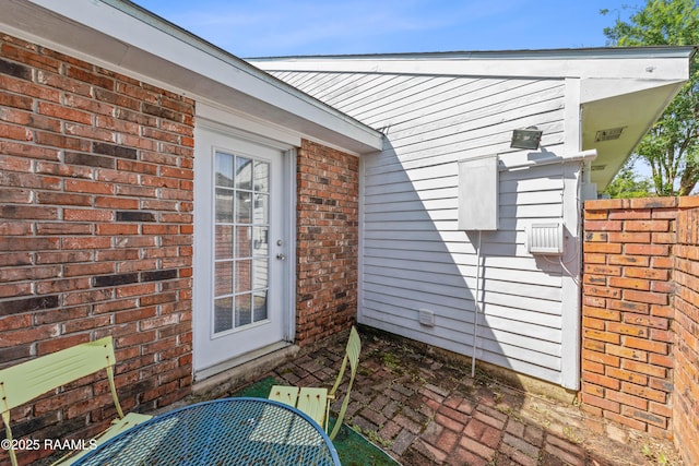 15 Courtyard Cir, Lafayette, LA 70508 - property entrance featuring brick siding
