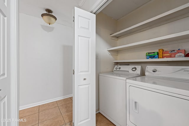 15 Courtyard Cir, Lafayette, LA 70508 - laundry room with washing machine and clothes dryer and light tile patterned flooring