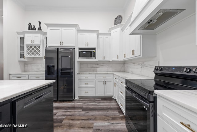 1114 Dermelie Calais Rd, Breaux Bridge, LA 70517 - kitchen with black range with electric stovetop, fridge with ice dispenser, range hood, stainless steel microwave, and dishwasher
