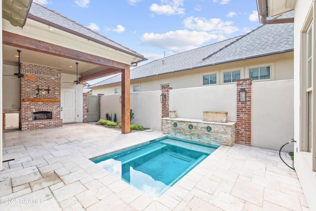 106 Brickell Way, Lafayette, LA 70508 - view of swimming pool featuring an outdoor brick fireplace, a patio, ceiling fan, area for grilling, and a pool