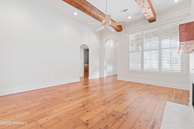 106 Brickell Way, Lafayette, LA 70508 - unfurnished room featuring arched walkways, beam ceiling, light wood finished floors, ceiling fan, and ornamental molding