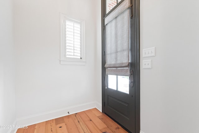 106 Brickell Way, Lafayette, LA 70508 - doorway to outside with light wood-style floors and healthy amount of natural light