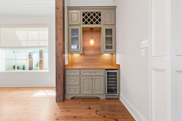 106 Brickell Way, Lafayette, LA 70508 - indoor dry bar with beverage cooler and wood finished floors