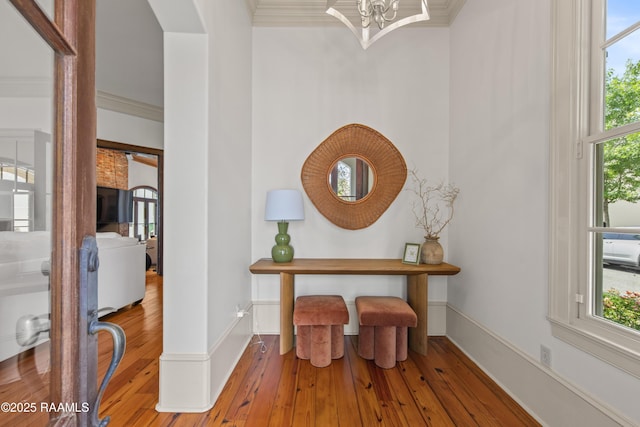 407 Arabella Blvd, Lafayette, LA 70508 - interior space featuring hardwood / wood-style flooring, crown molding, a chandelier, and a high ceiling