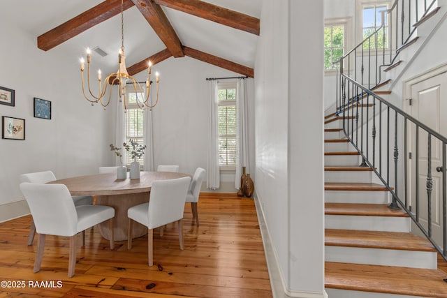407 Arabella Blvd, Lafayette, LA 70508 - dining space featuring a chandelier, stairway, and hardwood / wood-style floors